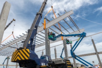 Cranes lifting steel